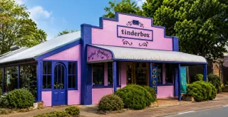 The pink-and-blue Tinderbox herbal shop on a Balingup street corner